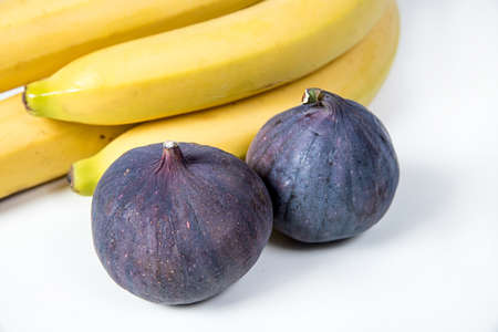 figs and bananas, beautiful fruits, bananas, purple figs, close-up, vitamins concept, vegan food, healthy eating,の写真素材
