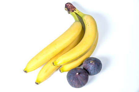 figs and bananas, beautiful fruits, bananas, purple figs, close-up, vitamins concept, vegan food, healthy eating,の写真素材