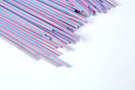 Colorful drinking straws isolated on white backgroundの写真素材