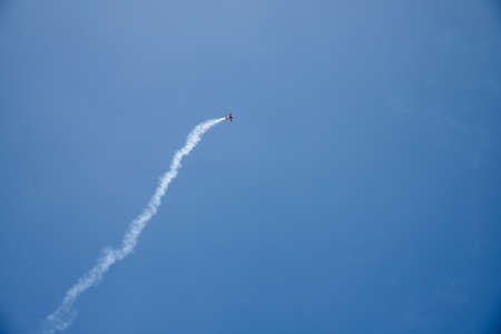 The plane makes a maneuver. Airplane in the sky - Passenger Airliner / aircraftの写真素材