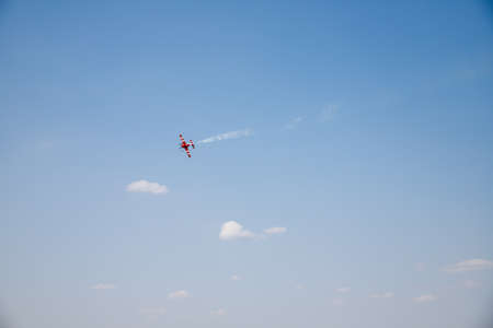 The plane makes a maneuver. Airplane in the sky - Passenger Airliner / aircraftの写真素材