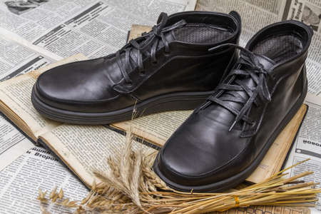 KHARKIV, UKRAINE - NOVEMBER 7, 2016: Men's brown leather shoes with accessories, flat lay, top viewのeditorial素材