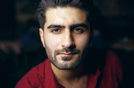 Sexy closeup portrait of handsome topless male model with beautiful eyes on the beach. Black and White.のeditorial素材