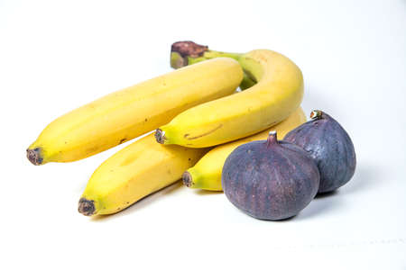 figs and bananas, beautiful fruits, bananas, purple figs, close-up, vitamins concept, vegan food, healthy eating,の写真素材