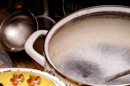 Moldy pumpkin in the pan. Close up mold viewの写真素材