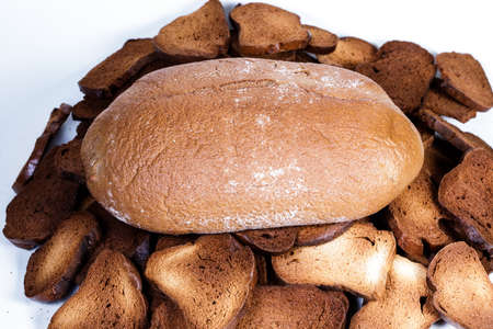 Black bread close-up. Texture on white backgroundの写真素材