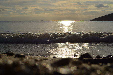 Sunset on the beach in the evening. Selective focus.の写真素材