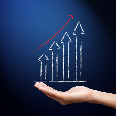Business graph on hand