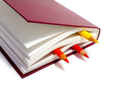 book and pencils