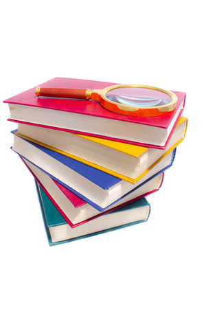 color books and magnifierの写真素材