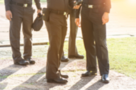 Blurred Police officer control in the stadium in soccer game. Official of Thailand.の写真素材