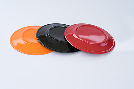 Melamine Black/Red/Orange Plate on white background.