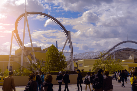 OSAKA, JAPAN - Oct 24, 2017: At the entrance and Roller Coaster at Universal studios Japan, there are many tourists to visit Universal Studios Japan famous amusement park, Osaka city.のeditorial素材