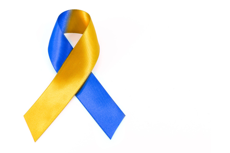 World down syndrome day with blue yellow awareness ribbon bow.の写真素材