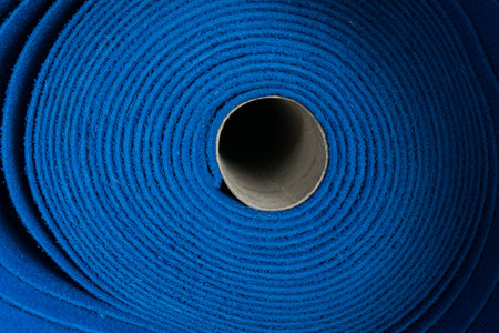 Blue carpet rolls in the factory.の写真素材
