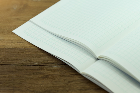 Stack blank notebook on wooden table for learning Japanese language writing words.の写真素材