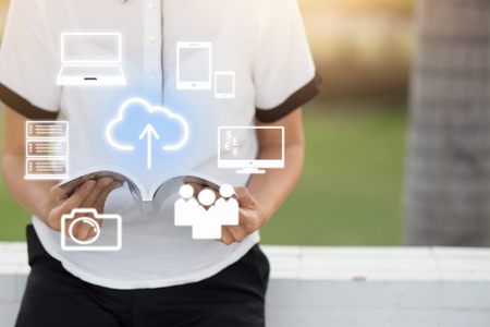 Young woman reading a book with modern icon at home  : Concept relax on holidayの写真素材