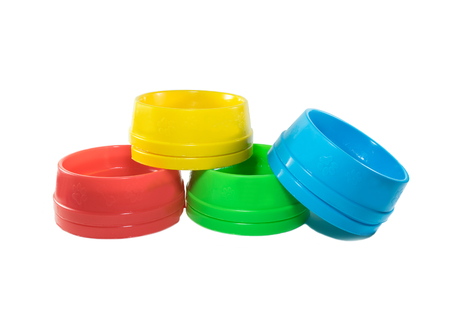 Pet accessories concept.  Bowls stack on isolated whiteの写真素材