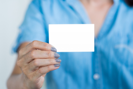 Business woman hand holding mock up name cardの写真素材