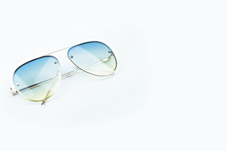 Sunglasses with copy space on isolated white background.  Object fashion concept.の写真素材