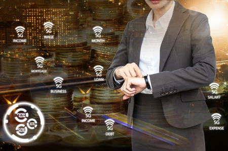 Double exposure of Business woman check the time with 5G network icon background.  Business with technology concept.の写真素材