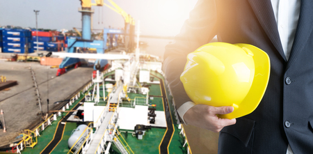 Double exposure of Engineering or Business people at construction site about transportation of logistics backgroundの写真素材