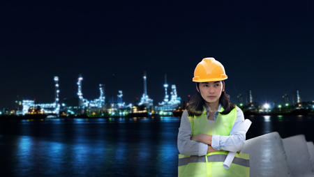 Double exposure of Engineering on power plant at night time background.の写真素材