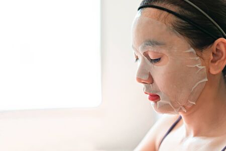 Cosmetic Mask on Face treatment women.  Beauty and fashion conceptの写真素材