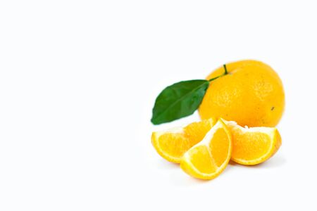Orange fruits with leaf on isolated white background.の写真素材
