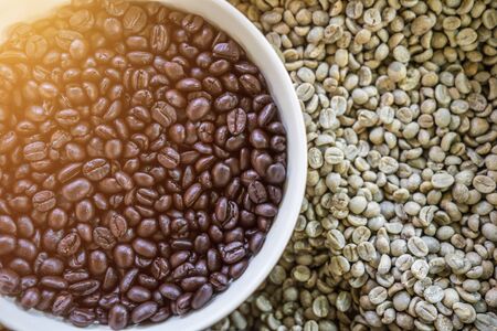 Coffee beans pile with warm lightの写真素材