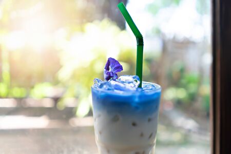 Iced coffee at cafe on tableの写真素材