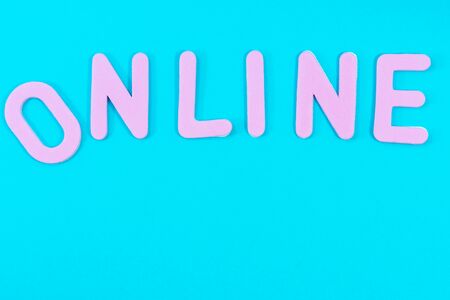 Text Online with copy space on blue background.の写真素材