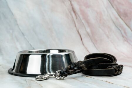 Bowl with leashes for dog or cat.   Pet accessories concept.の写真素材
