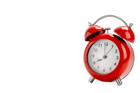 Red alarm clock on white backgroundの写真素材