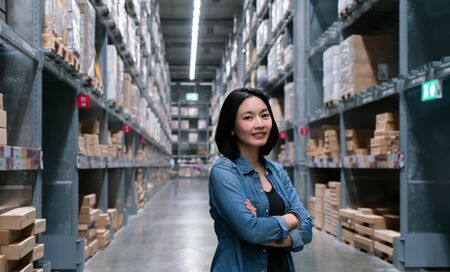 Business woman at warehouse for export and import conceptの写真素材