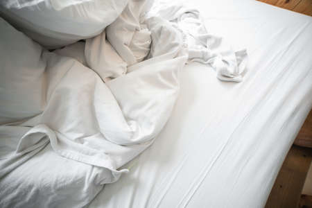 Blurred Empty Bed after wake up in the morning.の写真素材