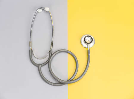 Stethoscope for doctor and copy space on color backgroundの写真素材