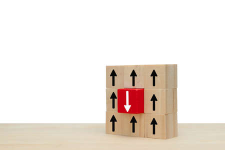 Business icon up and down symbol up and down investment or growth on wooden cubeの写真素材