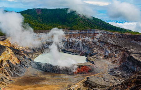 San Jose, Costa Rica - April 3, 2017:  The Poas Volcano, (Spanish: VolcÃÂ¡n PoÃÂ¡s), is an active 2,708-metre (8,885 ft) stratovolcano in central Costa Rica. It has erupted 40 times since 1828, including April, 2017 when visitors and residents were evacの写真素材