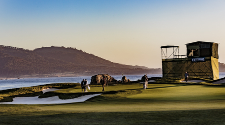Pebble Beach, California, February 17, 2018:  The famous 18th hole at the Pebble Beach golf links offers assorted seaview vistas in addition to challenging golf shots.のeditorial素材