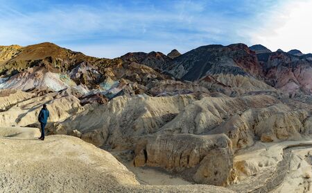Death Valley, California, USA - December 17, 2018:  Sunrise at the Artists Palette rock formation.  Vivid colors and bold mineral formations create this natural attraction.のeditorial素材