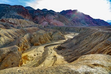 Death Valley, California, USA - December 17, 2018:  Sunrise at the Artists Palette rock formation.  Vivid colors and bold mineral formations create this natural attraction.のeditorial素材