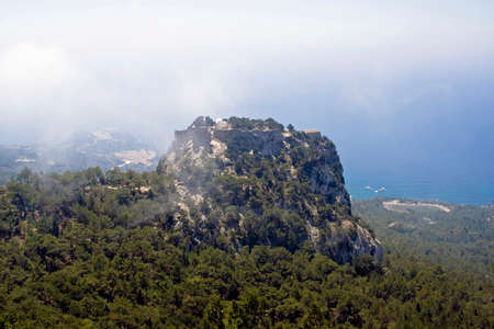 Monolithos hill with churchの写真素材