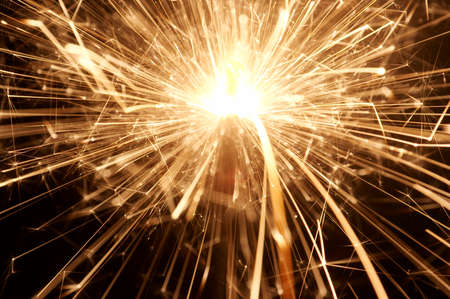 - Sparkler in action - burning sparklerの写真素材