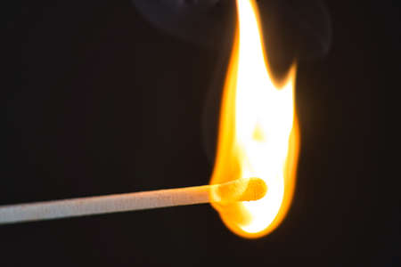 match is burning hot on blackの写真素材