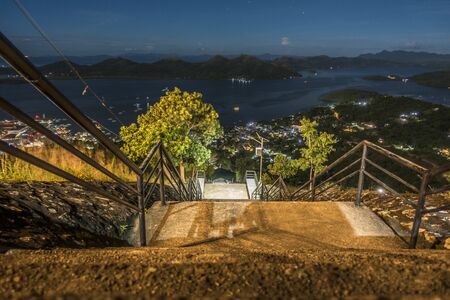 Path heading from the top of the island at nightの写真素材
