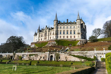 Large beautiful castle with green gardens and blue skyのeditorial素材