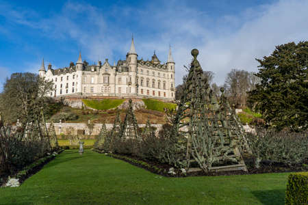 Castle with green grass in gardens and plantsのeditorial素材