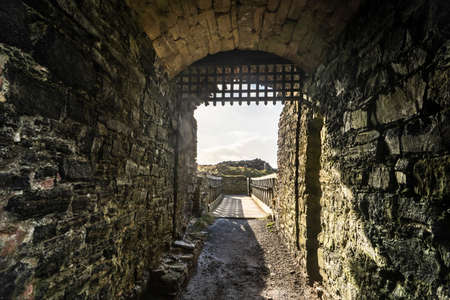 Entrance of the old ruins through archway and latticeのeditorial素材
