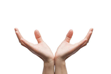 Hand holds a ball or object on a white background with paths